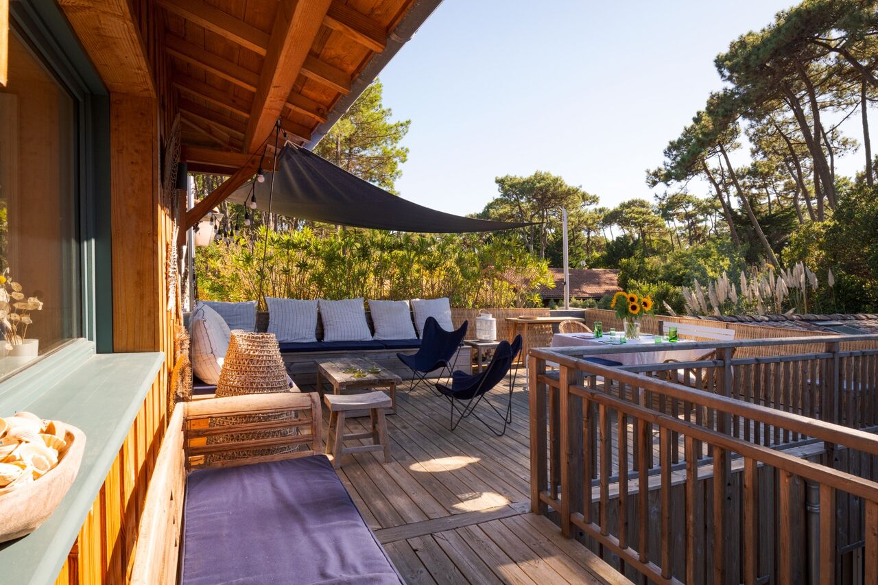 Terrace by day with garden lounge